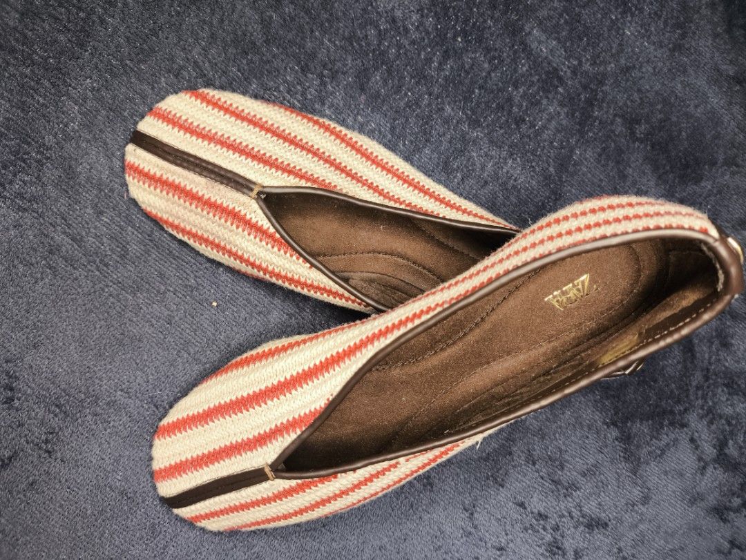 ZARA Ballet Flat (Category: Flats & Sandals) located in Las Pinas. Submitted by rose.luab (Listing ID 1468857086, Image 2). Description: Selling Preloved Zara Striped Ballet Flats in a multi-color red and cream knit pattern. Key Details • Brand: Zara • Style: Fabric slip-on ballet flats with a rounded toe and a central dark trim detail • Pattern: Red and cream/white vertical knit stripes with a low 0.4-inch (1 cm) sole.