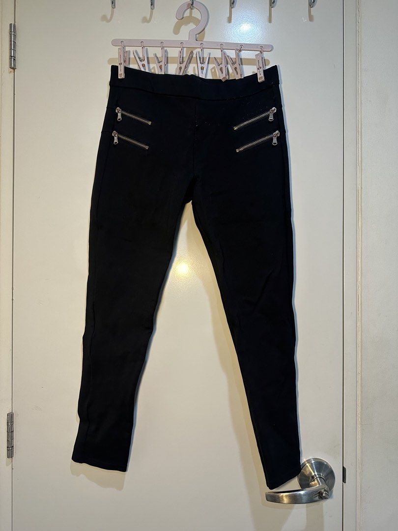 Zara Basic Collection Black Zipped Trousers Size L (Category: Jeans) located in Taguig. Submitted by ellajanee (Listing ID 1468778564, Image 2). Description: - Brand: Zara Basic Collection - Size: L (EUR/USA L, MEX 30) - Fit: Fitted cut with edgy silver-tone front hip zippers - Back: Clean design with no pockets - Fabric: Stretchy and super comfortable for all-day wear - Style: Great versatile staple to pair with casual tees or chic blouses.
