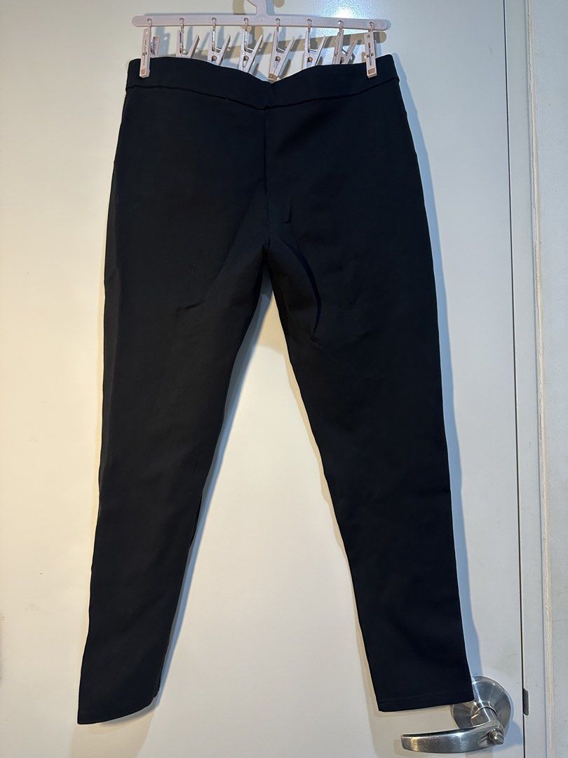 Zara Basic Collection Black Zipped Trousers Size L (Category: Jeans) located in Taguig. Submitted by ellajanee (Listing ID 1468778564, Image 3). Description: - Brand: Zara Basic Collection - Size: L (EUR/USA L, MEX 30) - Fit: Fitted cut with edgy silver-tone front hip zippers - Back: Clean design with no pockets - Fabric: Stretchy and super comfortable for all-day wear - Style: Great versatile staple to pair with casual tees or chic blouses.