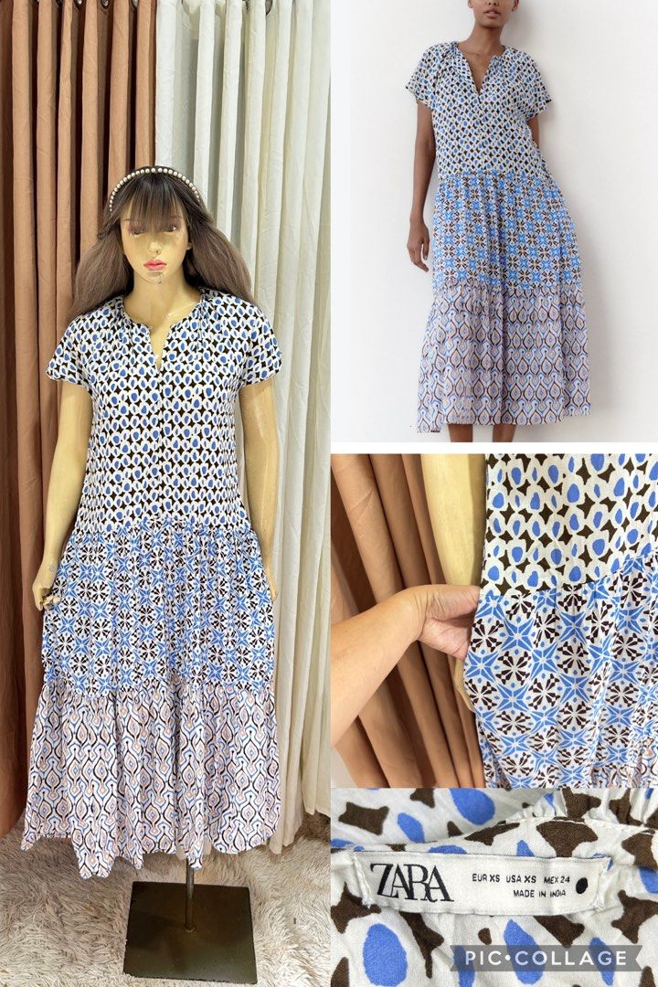 Zara Blue Patterned Tiered Midi Dress (Category: Dresses) located in Cebu City. Submitted by ontrendclxncebu (Listing ID 1468854906, Image 1). Description: - Brand: Zara - Style: Tiered midi dress with button front - Print: Mixed blue, brown, and white geometric pattern - Details: V-neckline with small collar, short sleeves, and side pockets - Size: XS - Origin: Made in India.