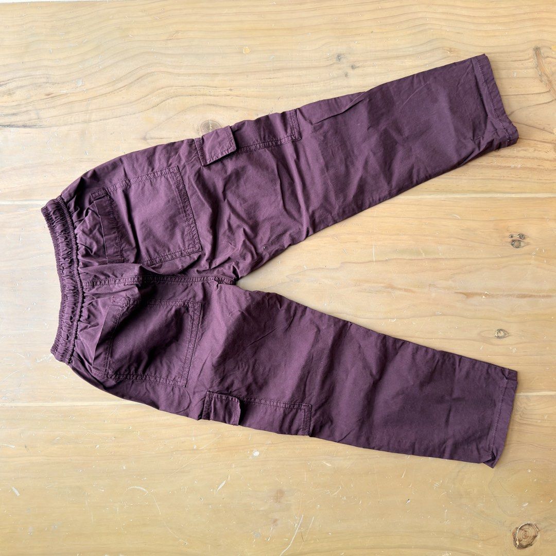 Zara Kids Cargo Pants Size 6 116cm (Category: Babies & Kids Fashion) located in Calamba. Submitted by letsygread9 (Listing ID 1468740579, Image 3). Description: - Brand: Zara - Item: Kids Cargo Pants - Color: Deep Purple - Size: 6 (116 cm) - Material/Origin: Made in Morocco - Waist: Elastic waistband with adjustable drawstring - Pockets: Practical utility pockets on sides and back legs - Condition/Use: Great everyday trousers for kids.