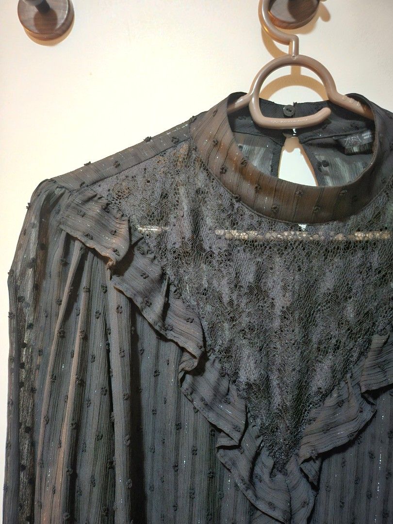 Zara Lace Long Sleeves (Black) (Category: Longsleeves) located in Quezon City. Submitted by nndvy (Listing ID 1468853918, Image 2). Description: - Brand: Zara (bought from Trinoma) - Size: L - Bust Width: 56cm - Length: 65cm - Condition: Never worn. No flaws to declare - RFS: Decluttering - MOP: Gcash, BPI, Unionbank, BDO - Delivery: GrabExpress, Lalamove, LBC (shouldered by buyer).