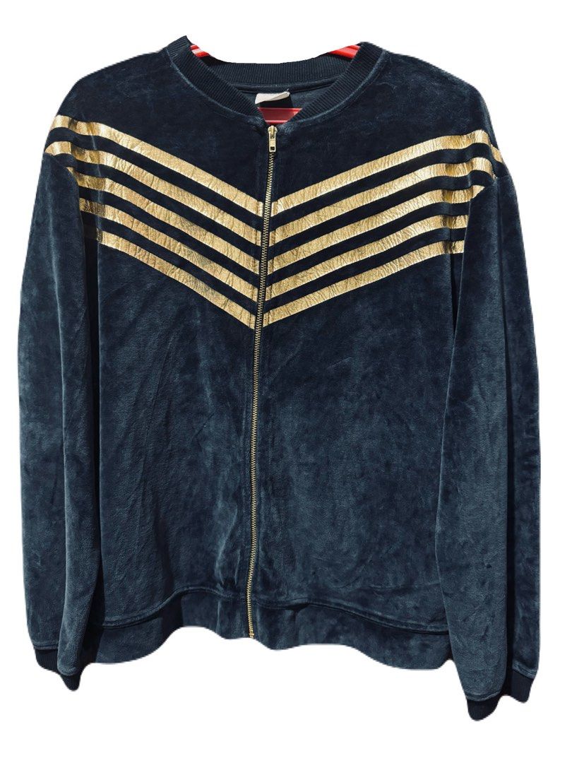 ZARA Navy Velour Bomber Jacket Gold Stripes (Category: Coats, Jackets and Outerwear) located in La Trinidad. Submitted by whatnotcollections (Listing ID 1468866186, Image 3). Description: - Color: Dark navy blue - Material: Soft plush velour - Design: Gold metallic chevron stripes on the chest with pleated upper back detail - Hardware: Full front zipper with gold pull tab - With 2 pockets. - Fit/Finish: Ribbed collar, cuffs, and hem - Style: Grea