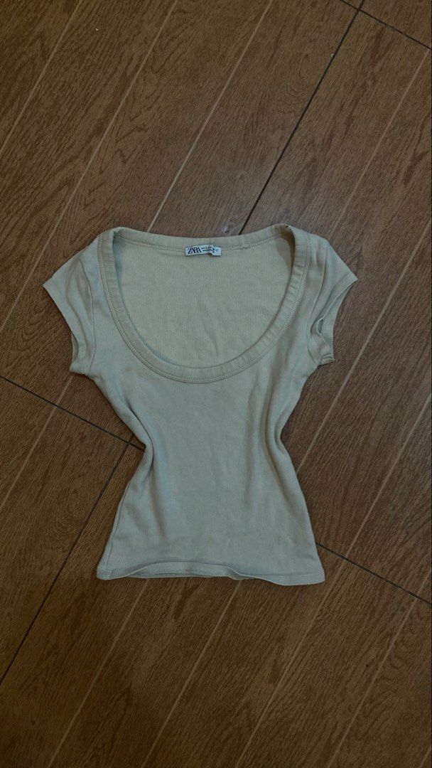 Zara Ribbed Scoop Neck Top Size S (Category: Sleeveless) located in Subic. Submitted by bottomjeanzgals (Listing ID 1468843647, Image 1). Description: - Brand: Zara - Style: Ribbed slim-fit top - Color: Light beige - Size: Small - Condition: Excellent pre-loved condition .