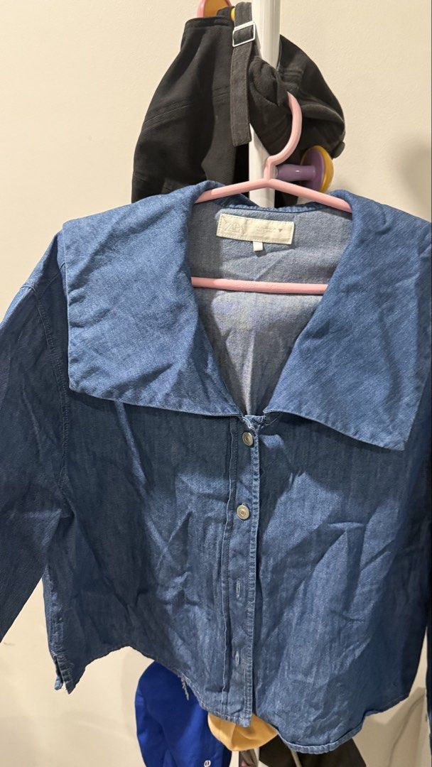 Zara Sailor Collar Denim Shirt (Category: Blouses) located in Makati City. Submitted by andrae.thomas (Listing ID 1468886281, Image 2). Description: - Brand: Zara - Style: Cropped denim shirt with wide sailor collar - Color/Wash: Medium wash blue - Details: Button-down front, long sleeves with button cuffs - Fit: Cropped - Condition: Excellent / Like new Size: XS Location: Makati Meet up: Taft, DLSU, CSB Shipping: Lalamove.
