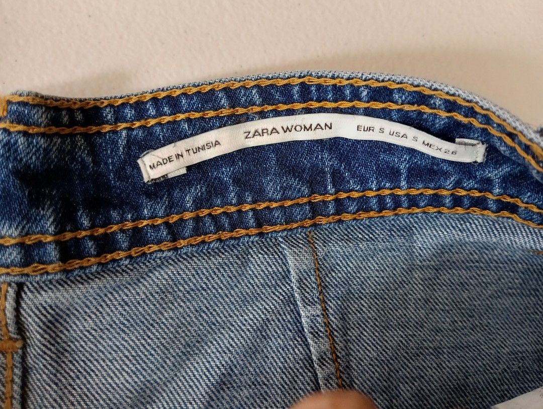 Zara Skirt (Category: Skirts) located in Rizal. Submitted by timeless_shop (Listing ID 1468729237, Image 3). Description: 🔥 ORIGINAL ZARA WOMAN Denim Mini Skirt - Size S 📏 Length: 17.5 inches 📏 Waist Width: 14 inches lay flat 📏 Size Fit: 26-27 📏 Tag: ZARA WOMAN - EUR S USA S MEX 26 - Made in Tunisia 🎨 Color: Denim Blue - buo pa kulay! ✂️ Style: High Waist Denim Mini Skirt - 4 Buttons Front + Patch Pockets! 💯 Good Condition: 9.8/10 🎨 Color