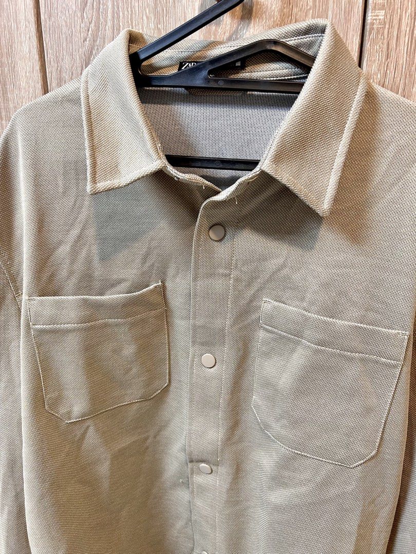 ZARA Textured Longsleeve Polo (Category: Coats, Jackets and Outerwear) located in Cebu City. Submitted by shop.bydee (Listing ID 1468829334, Image 2). Description: Zara Longsleeve Polo • Size XL • Used twice only No meet-ups, only delivery. SF will be shouldered by the buyer. 📍Cebu.