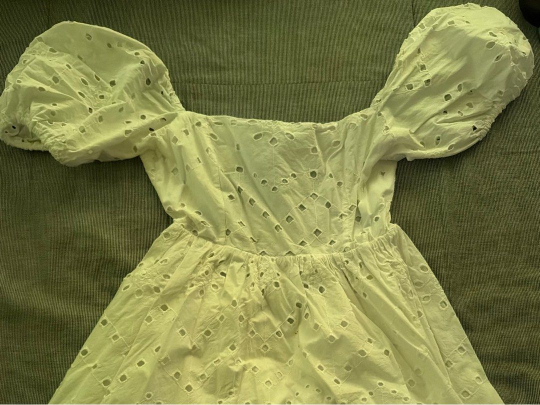Zara White Backless Dress Size S (Category: Dresses) located in Manila. Submitted by jaehyun2829 (Listing ID 1468736699, Image 1). Description: - Brand: Zara - Style: White eyelet dress with puff sleeves and square neckline - Details: Back cutout with tie closure, gathered waist, and flared skirt - Material: Light cotton (Made in India) - Size: S - Worn once .
