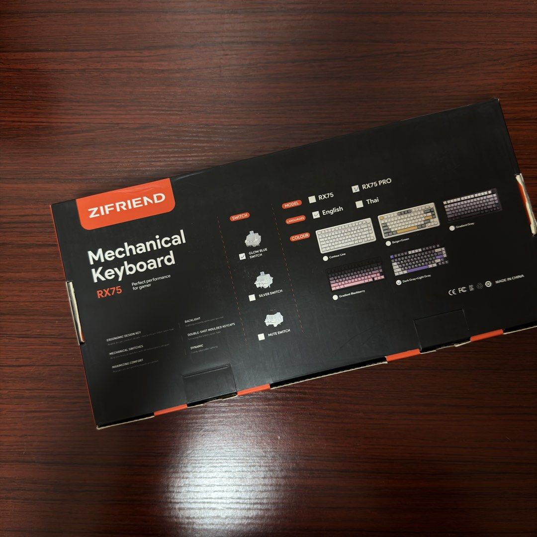 Zifriend RX75 Mechanical Keyboard (Category: Computer Keyboard) located in Quezon City. Submitted by teejcoching (Listing ID 1468778267, Image 2). Description: - Brand: Zifriend RX75 Mechanical Keyboard - Color: Gray and White with colorful RGB lighting - Condition: Brand new, never used (opened only to take photos) - Inclusions: Original box, USB cable, extra purple keycaps, and sealed spare switches - Rado for grabs: Perfect for your setup upgr