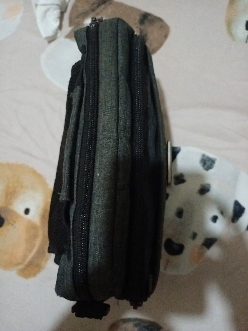Ztrans Gear Multi Compartment Grey Pouch Bag (Category: Belt bags, Clutches and Pouches) located in Manila. Submitted by luckyeagle-7ff8 (Listing ID 1468879797, Image 2). Description: - Brand: Ztrans Gear - Color: Grey - Material: Durable textured fabric with sturdy dual zippers and branded metal pull tabs - Organization: Multiple zipped compartments inside for easy storage - Comfort & Portability: Mesh-padded back and reinforced carry handle - E
