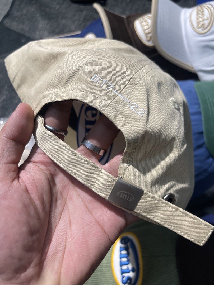 100% Authentic Emis Cap | Beige Embroidered Logo Baseball Cap | Adjustable Fit (Category: Caps & Hats) located in Valenzuela. Submitted by oseancollective (Listing ID 1469033845, Image 3). Description: 100% Authentic. Money-back guarantee if proven not legit. A stylish Emis cap featuring a signature embroidered logo in a versatile beige color. Perfect for everyday wear, streetwear outfits, and casual OOTDs. Product Details: * Brand: Emis * Color: