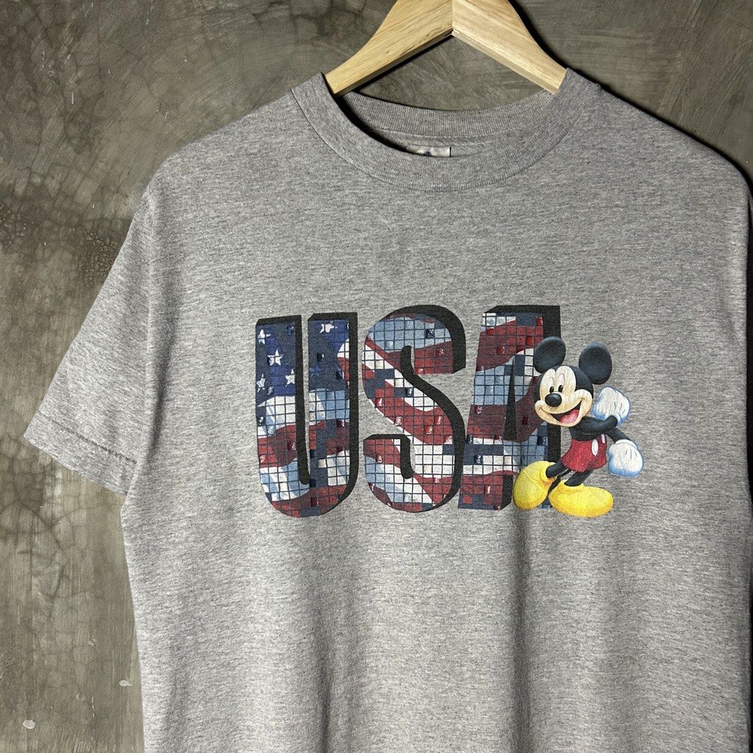 2000’s Mickey USA Shirt (Category: Tshirts & Polo Shirts ) located in Tayabas. Submitted by streetdept.ph (Listing ID 1469115438, Image 2). Description: 2000’s Mickey USA Shirt Very good condition Flaw/s: mini hairlines and yellow stain (needswash) Size: Medium Measurements (inches): Width: 19.5” Length: 27.5”.