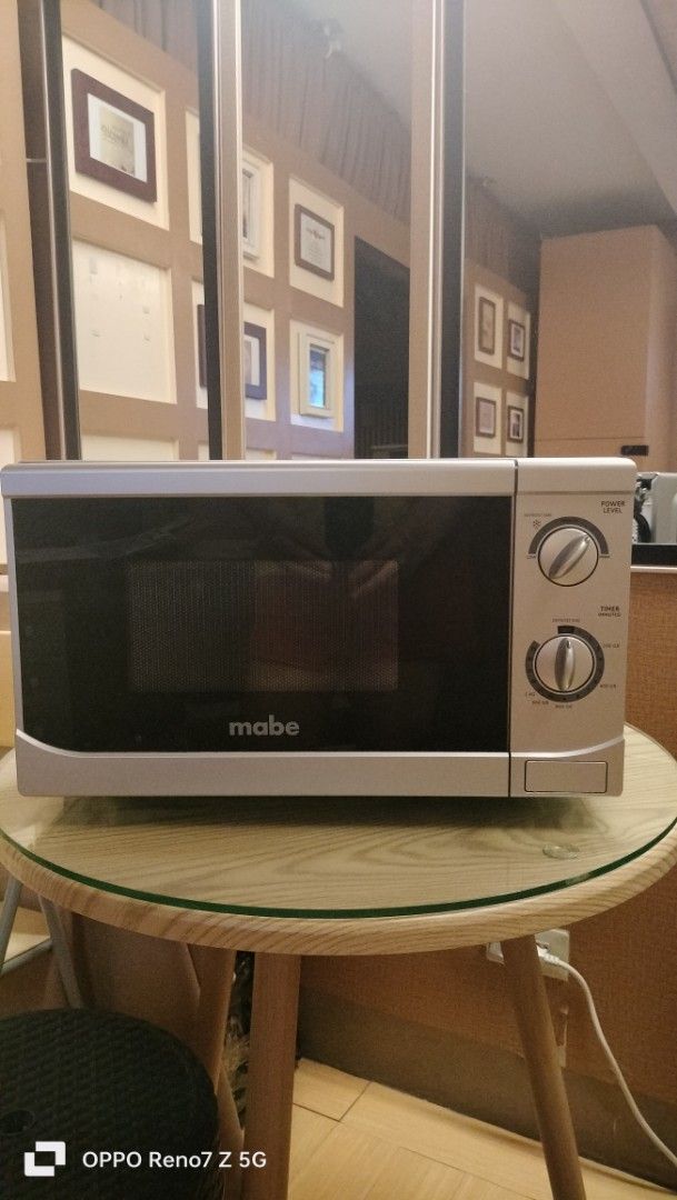 20L Mabe Microwave Oven (Category: Ovens & Toasters) located in Cainta. Submitted by randypizon (Listing ID 1469093001, Image 1). Description: mabe 20L microwave 7 weeks use from company event and it was kept and never used after the event. no issue working in good condition looks like new no rust and dents very clean RFS: company pull-out - Brand: Mabe Countertop Microwave - Color: Sleek silver body with a black door - Controls: User-friendly du
