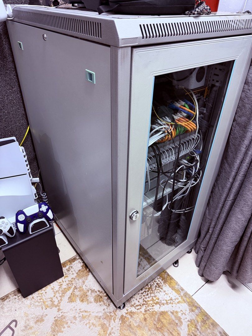 24U Solid High Quality Server Rack (Category: Shelves, Cabinets & Racks) located in Johor Bahru. Submitted by azharharon (Listing ID 1468979245, Image 2). Description: Enterprise Grade Server Rack can handle up to 500kg Purchase price almost rm4k (in SG) high quality usually not selling online, only made for Enterprises used to run 3 blade servers, with heat and noise isolation installed, barely hear all devices there, even no issues running at m