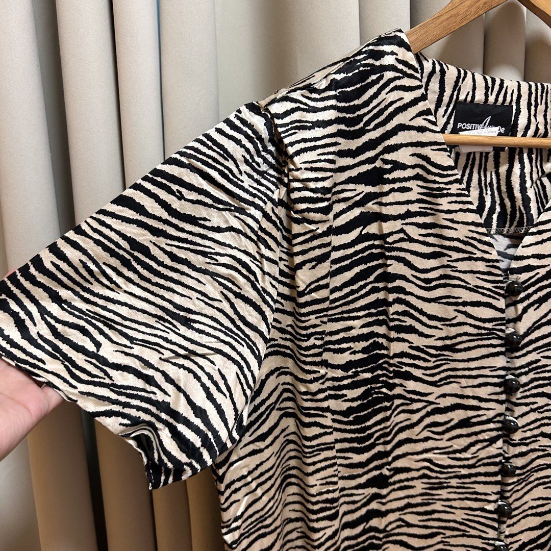 2XL Zebra Print Top (Category: Blouses) located in Rizal. Submitted by from99abovecloset (Listing ID 1468976753, Image 2). Description: CODE:177 Size: 2XL Armhole (laid flat):12” Bust (around): 52” Length (laid flat): 30” Cotton rayon | loose | with light stain .