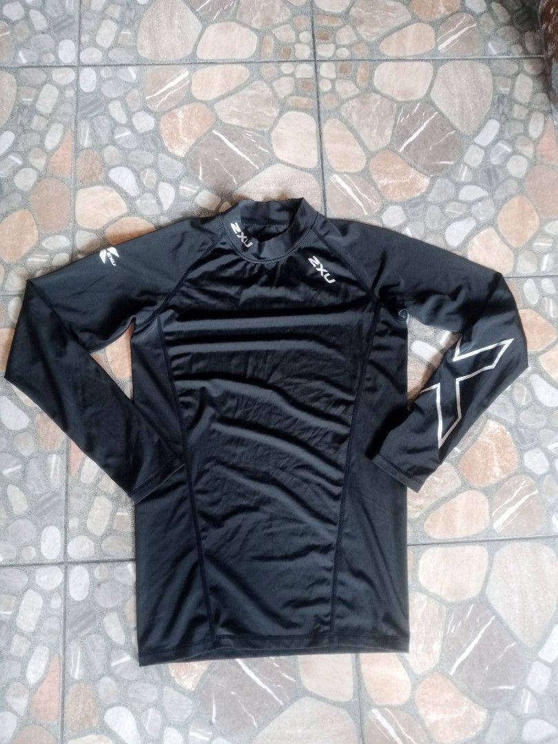 2XU Ignition Compression Long Sleeve Top Black (Category: Activewear) located in Dasmarinas. Submitted by francoprancisco (Listing ID 1469009853, Image 2). Description: - Brand: 2XU Ignition Conpression l/s shirt. - Color: Black with signature silver branding - Design: Long sleeves with mock neck - Comfort: Flatlock seams to prevent chafing - Performance: Moisture-wicking fabric keeps you dry - Ideal for: Running, gym sessions, and outdoor sports