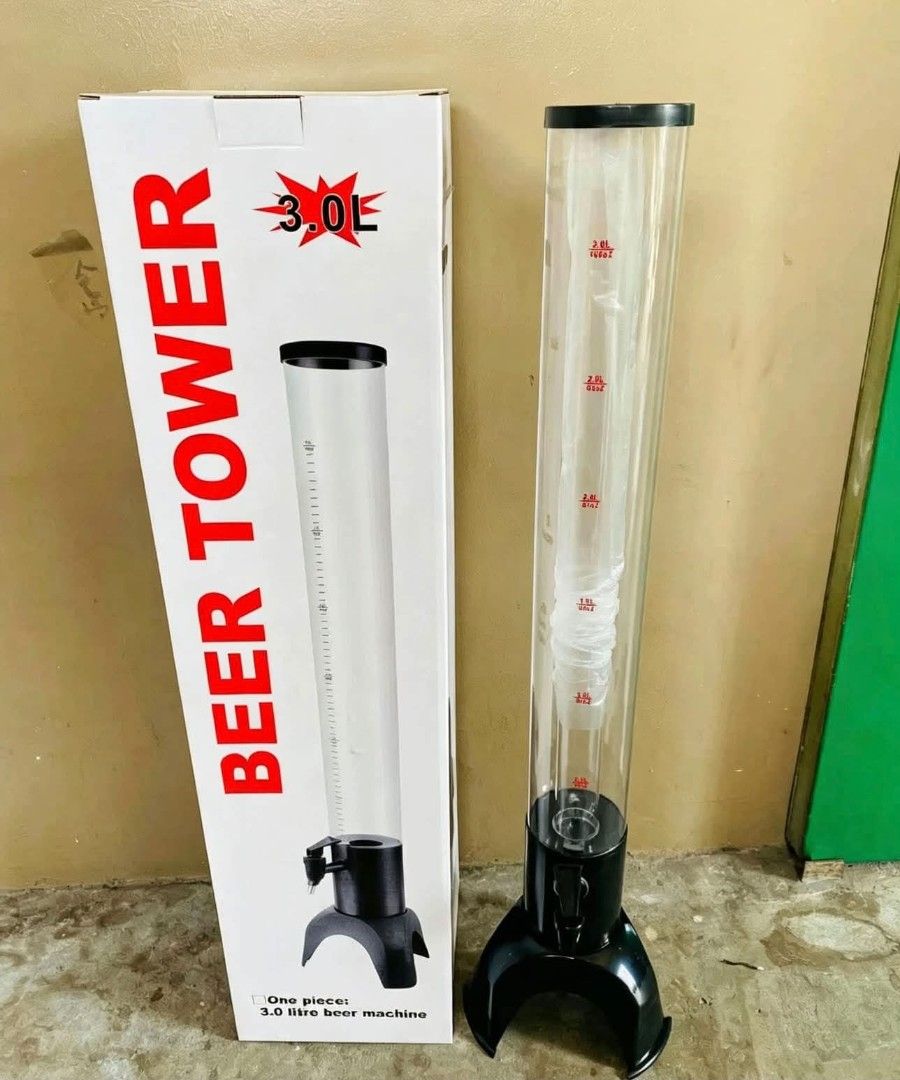 3.0L Beer Tower Drink Dispenser with Box (Category: Pitchers & Dispensers) located in Manila. Submitted by ericklee23 (Listing ID 1469084812, Image 1). Description: - Capacity: 3.0 litres, ideal for parties and gatherings - Design: Clear plastic tube with red measuring markings, black base, and tap handle - Packaging: Includes original cardboard box - Material: Durable plastic - Function: Handy and easy to use for dispensing beer and other drinks