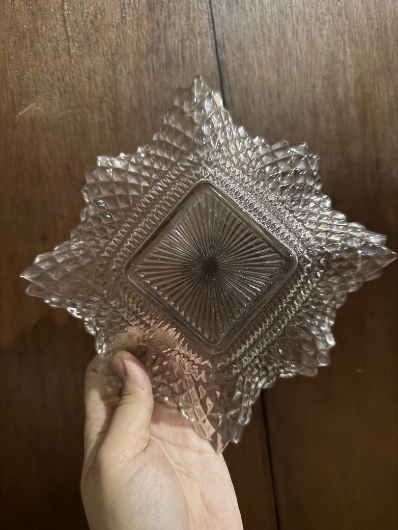 3pcs Diamond Pattern Clear Glass Bowl (Category: Vases & Decorative Bowls) located in Quezon City. Submitted by ae.thina (Listing ID 1469018074, Image 2). Description: Take all for 500 200 if per piece - Type: Clear heavy pressed glass bowl - Design: Square shape with a pointed scalloped rim, textured diamond pattern, and sunburst star center - Use: Perfect for serving snacks or as a coffee table decor piece - Shipping: Packed securely for safe d