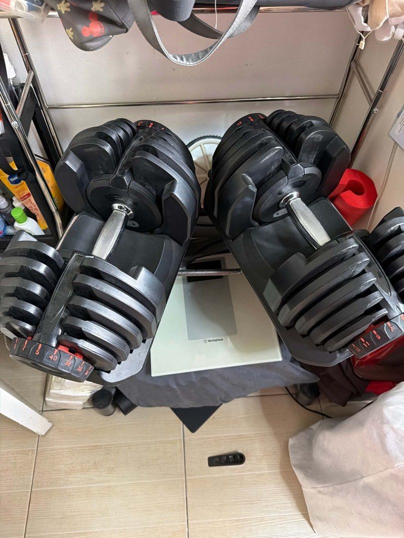 40kg Adjustable Dumbbell Pair with Stand (Category: Weights & Dumbbells) located in Marikina City. Submitted by jmgtech (Listing ID 1469042168, Image 1). Description: - Total Weight: 40kg adjustable dumbbell set (5 to 40kg per piece) - 17 different weight levels for progressive training - Rubber-coated plates with an easy twist selection mechanism - Quick and seamless weight changes - Space-saving design that replaces a full rack of traditional d