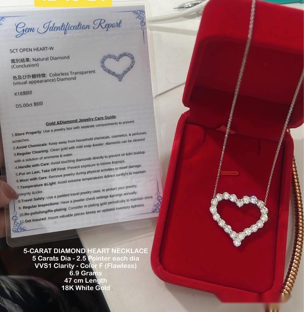 5-Carat Diamond Heart Necklace (Category: Necklaces) located in Imus. Submitted by pguecs (Listing ID 1468945749, Image 2). Description: - Item: 5-carat natural diamond heart necklace - Metal: 18K white gold (Solid build, 6.9 grams total weight) - Diamond Details: VVS1 clarity, Color F (Flawless), 2.5 pointer each - Chain Length: 47 cm - Inclusions: Gem identification report and red jewelry box RFS: need funds for a home project. Meetups only in 