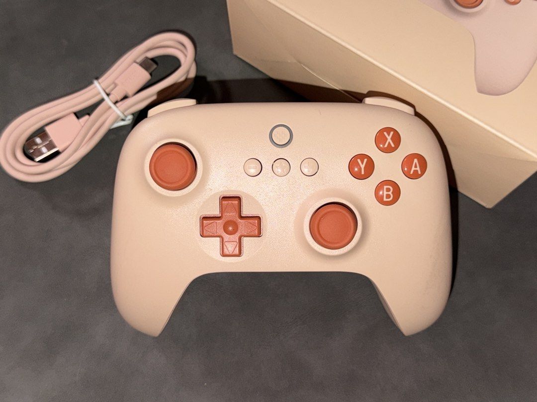 8BitDo Ultimate C Bluetooth Controller Orange (Category: Controllers) located in Mandaluyong City. Submitted by knb.ph (Listing ID 1468972716, Image 1). Description: - Item: 8BitDo Ultimate C Bluetooth Controller - Color: Orange - Compatibility: Nintendo Switch (System v3.0.0 and newer) - Connectivity: Bluetooth wireless or wired USB - Inclusions: Original box and matching 1-meter charging/data cable - Condition: Excellent, well-maintained.