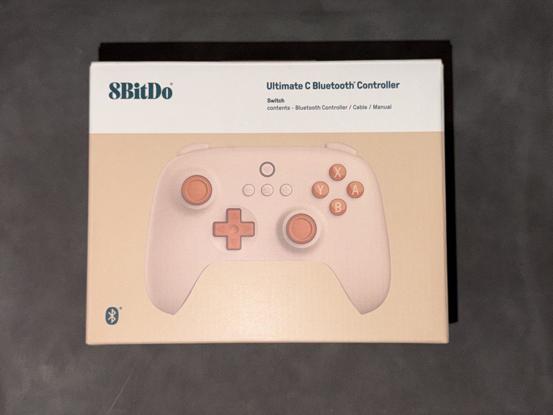 8BitDo Ultimate C Bluetooth Controller Orange (Category: Controllers) located in Mandaluyong City. Submitted by knb.ph (Listing ID 1468972716, Image 2). Description: - Item: 8BitDo Ultimate C Bluetooth Controller - Color: Orange - Compatibility: Nintendo Switch (System v3.0.0 and newer) - Connectivity: Bluetooth wireless or wired USB - Inclusions: Original box and matching 1-meter charging/data cable - Condition: Excellent, well-maintained.