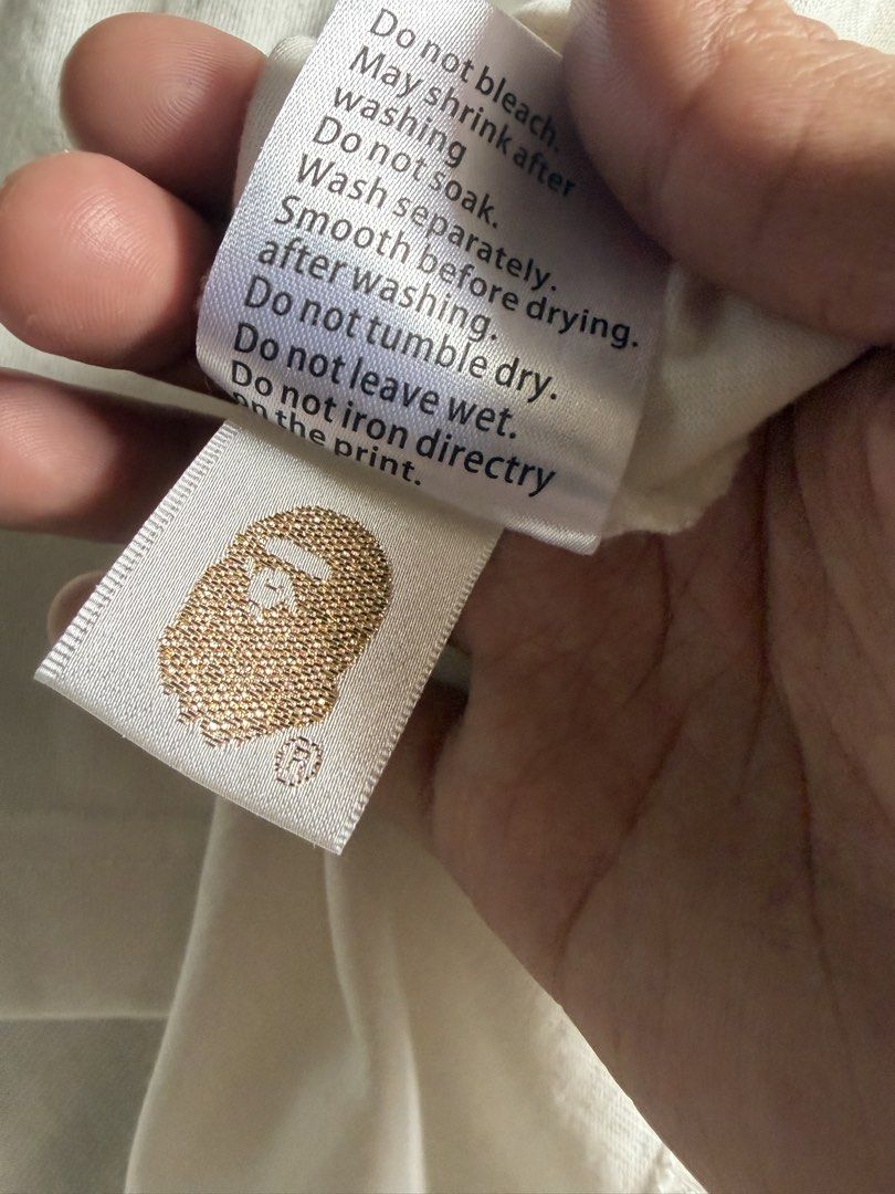 A Bathing Ape Shirt - Garment Dye Tee Ivory (Category: Tshirts & Polo Shirts ) located in Manila. Submitted by sintaxlaw (Listing ID 1469035152, Image 3). Description: A Bathing Ape Garment Dye Logo Relaxed Fit Tee P4500 (Slightly Negotiable) Used twice/washed twice 100% Original/Authentic S on Tag (Size runs big) Oversized Fit L: 27 W: 25 No issues/Manila location.