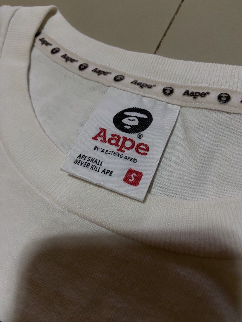 AAPE BY A BATHING BAPE (Category: Tshirts & Polo Shirts ) located in San Pablo. Submitted by tripnthrift15 (Listing ID 1468942190, Image 2). Description: AAPE SIZE SMALL ON TAG COMPLETE TAGS GOOD CONDITION DIMES 19*26 .