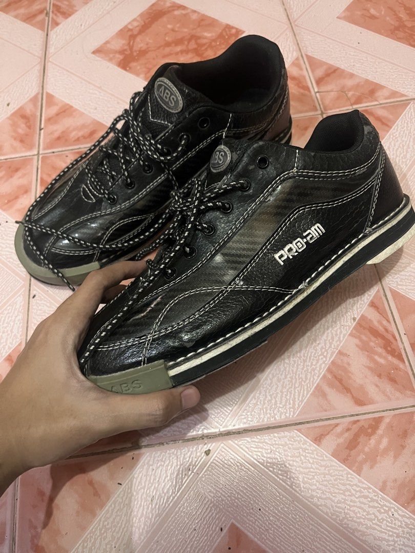 ABS Pro-Am Black Bowling Shoes (Category: Sneakers) located in Pasig City. Submitted by calmfish-776876 (Listing ID 1468981986, Image 1). Description: - Brand/Model: ABS Pro-Am Bowling Shoes - Color: Black with white contrast stitching and striped laces - Protection & Grip: Grey rubber toe caps and durable rubber soles - Ideal For: League nights or casual bowling sessions - Condition: Sturdy build and ready to use.