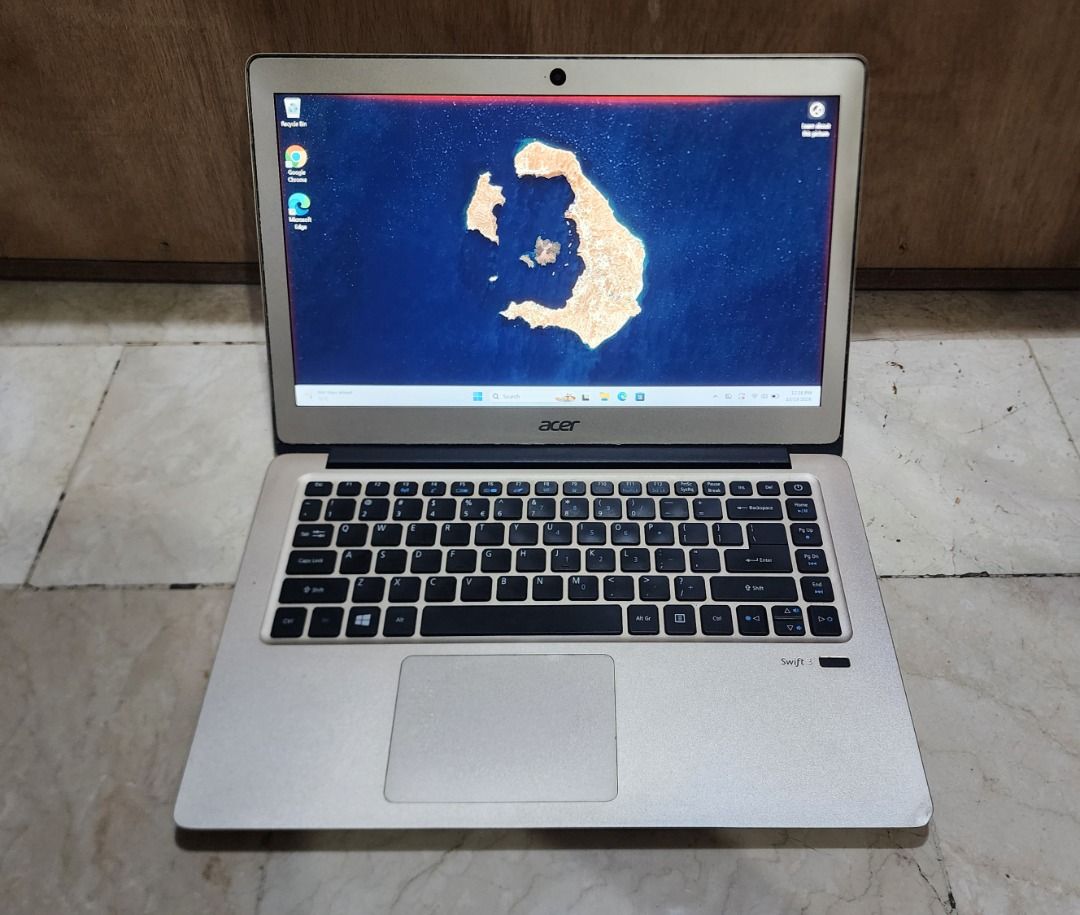 Acer Swift i5 7th Gen Laptop (Category: Laptops & Notebooks) located in Quezon City. Submitted by protogen (Listing ID 1469040050, Image 2). Description: Acer Swift SF314-51 Laptop Intel Core i5 7200U Processor 8GB RAM 256 GB SSD 14 inches display 3-4 hours battery life Backlit keyboard Windows 11 and Microsoft Office 2021 installed Issues: - Screen has orange on sides, also has white pixels (see 3rd to 5th photos) - Cosmetic issues (dents, rubbe