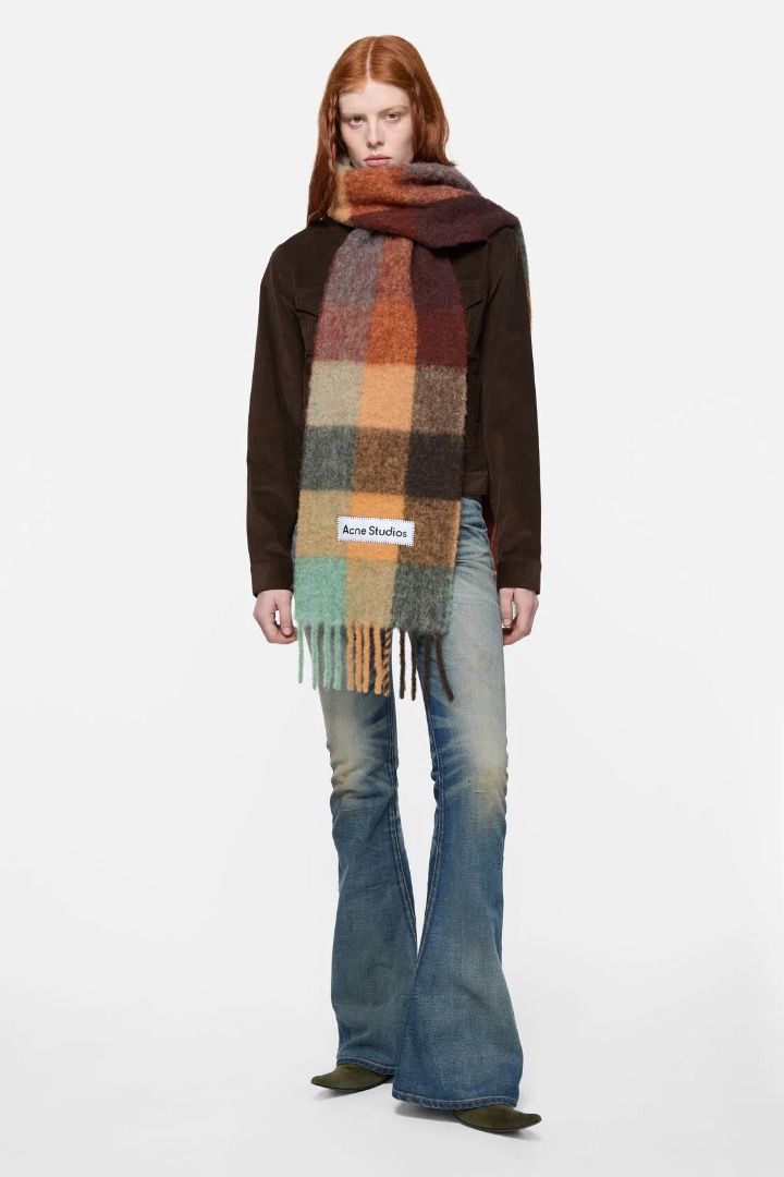 Acne Studios D*pe Checked Wool Scarf Multi-color (Category: Scarves) located in Pasig City. Submitted by jultzn (Listing ID 1469010033, Image 1). Description: - Brand: Acne Studios D*pe - Design: Multi-color plaid (brown, orange, grey, teal) with signature large white label - Material: Super soft, chunky wool texture - Style: Extra long drape with classic fringed hem - Condition: Brand new in storage, zero flaws - Perfect for adding a pop of colo