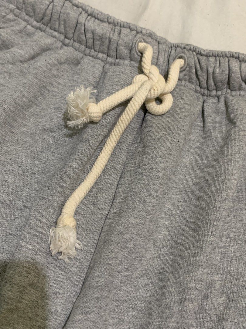 Acne studios gray cotton short for men (Category: Shorts) located in Roxas City. Submitted by vaultcultureco. (Listing ID 1469094388, Image 3). Description: - Brand: Acne Studios - Item: Men's cotton shorts - Color: Gray - Size: S - Material: 100% Cotton (Made in Portugal) - Features: Adjustable drawstring waistband, side pockets, and signature Acne Studios face logo patch - Condition: Excellent pre-owned condition.
