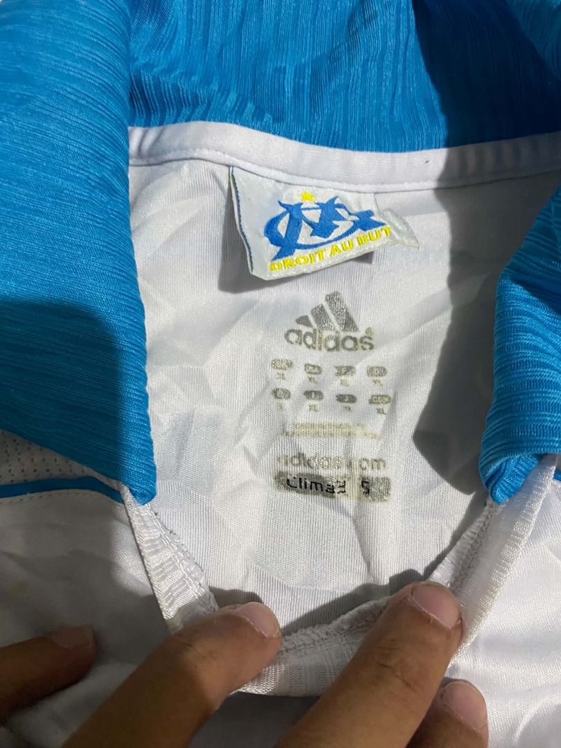 Adidas - 2008/09 Olympique de Marseille (Category: Formal Shirts) located in Caloocan City. Submitted by blackrainxd (Listing ID 1469003537, Image 3). Description: Excellent Condition Size XL Width 21 Length 28 Color rate 9/10 Crack prints, cut tags, check last pic 450 + Shipping fee Tuguegarao City, Cagayan 📍 .