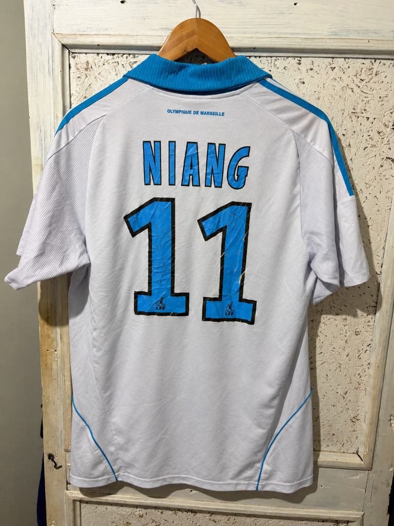 Adidas - 2008/09 Olympique de Marseille (Category: Formal Shirts) located in Caloocan City. Submitted by blackrainxd (Listing ID 1469003537, Image 2). Description: Excellent Condition Size XL Width 21 Length 28 Color rate 9/10 Crack prints, cut tags, check last pic 450 + Shipping fee Tuguegarao City, Cagayan 📍 .