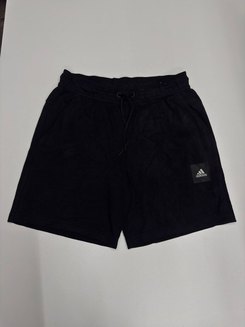 Adidas Black Athletic Shorts with Drawstring (Category: Shorts) located in Bustos. Submitted by thenlnclot60500 (Listing ID 1468970663, Image 1). Description: - Brand: Adidas - Color: Black - Waistband: Elastic with adjustable drawstring and inner branding print - Pockets: 2 side slip pockets and 2 back welt pockets - Material: Recycled polyester pocket lining - Origin: Made in Cambodia.