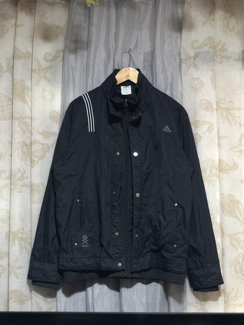 Adidas Black Quilted Windbreaker Jacket XXL (Category: Coats, Jackets and Outerwear) located in Calbayog City. Submitted by thriftme.bro (Listing ID 1469091384, Image 1). Description: Classic black Adidas jacket in size XXL. Features white three-stripe detailing, full zip with snap buttons, and a stylish quilted pattern. Great layering piece for cooler weather. Grab it now!.