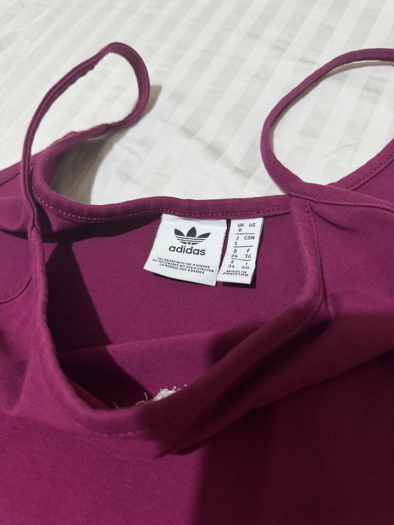 adidas bodycon dress (Category: Dresses) located in Marikina City. Submitted by fatherzav (Listing ID 1469023843, Image 3). Description: RFS: decluttering authentic size L on tag, fits S-M no flaws, above the knee length MOP: bdo, gcash MOD: j&t, lalamove .