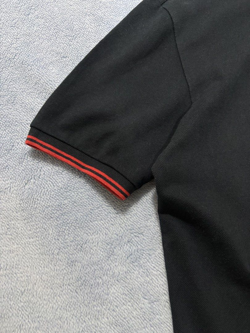 ADIDAS Clima365 Polo Shirt (Category: Tshirts & Polo Shirts ) located in Alburquerque. Submitted by ukay_ni_edgar (Listing ID 1469017481, Image 3). Description: Classic black with bold red accents. Sporty details, clean look, and timeless Adidas style..