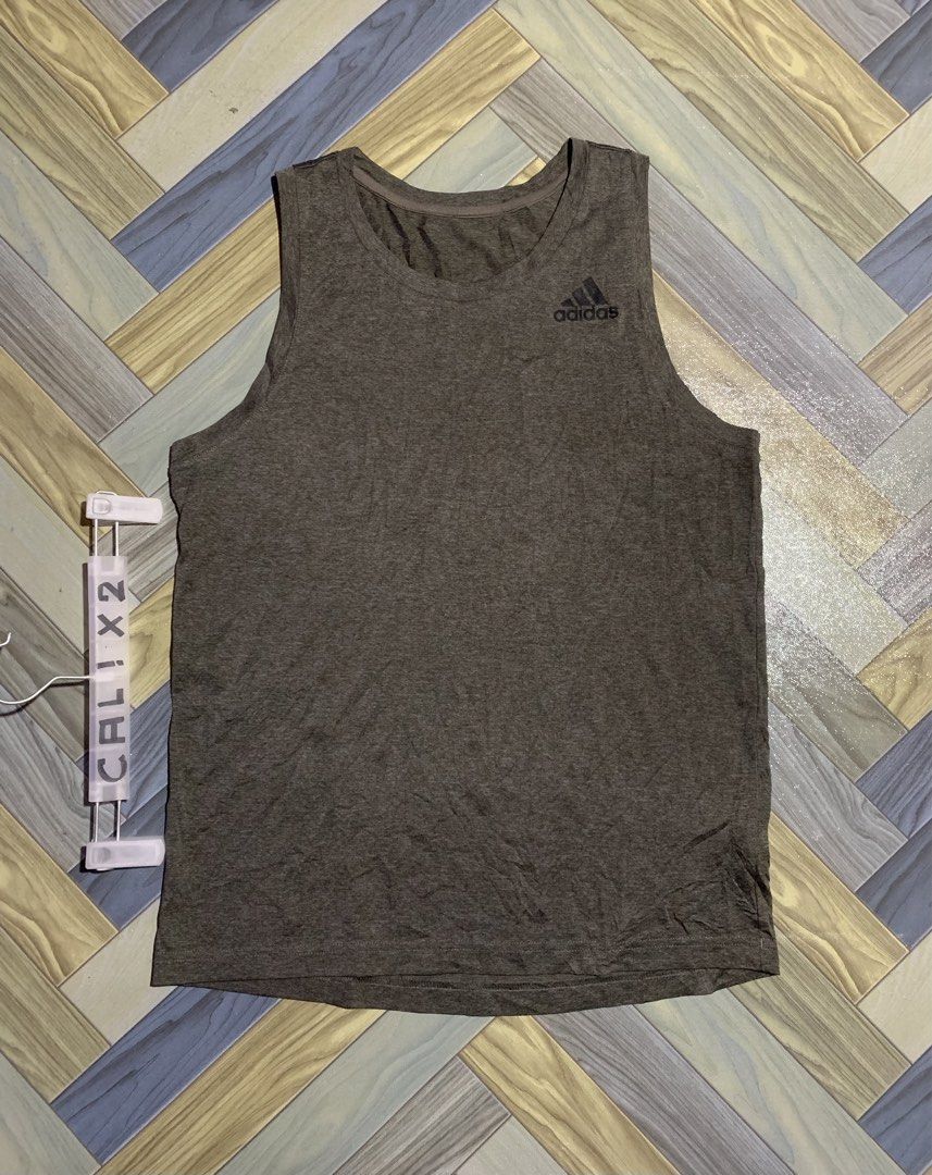 ADIDAS CLIMALITE TANK TOP (Category: Activewear) located in Kapalong. Submitted by ac_thrift (Listing ID 1469098689, Image 1). Description: ADIDAS CLIMALITE TANK TOP Size: Small fitting Dimes: W18.5 x L26-27 Color rate: 10/10 Condition: Excellent MoP: Gcash Location: Mindanao, Davao del Norte, Kapalong, 8113.