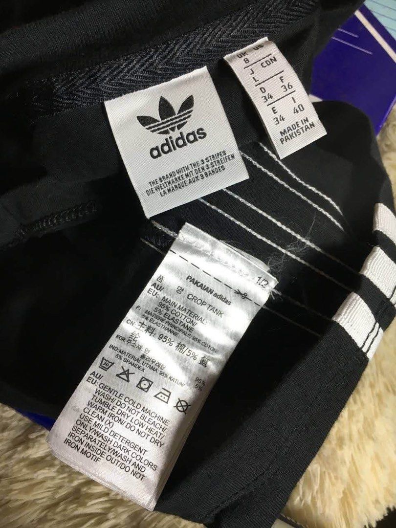 Adidas Crop Tank Top (Category: Sleeveless) located in Pagadian. Submitted by angelcanzado (Listing ID 1468973866, Image 2). Description: Adidas Crop Tank Top Excellent Condition Complete Tags Very black actual 10/10 Embroidered logo Small - Medium .