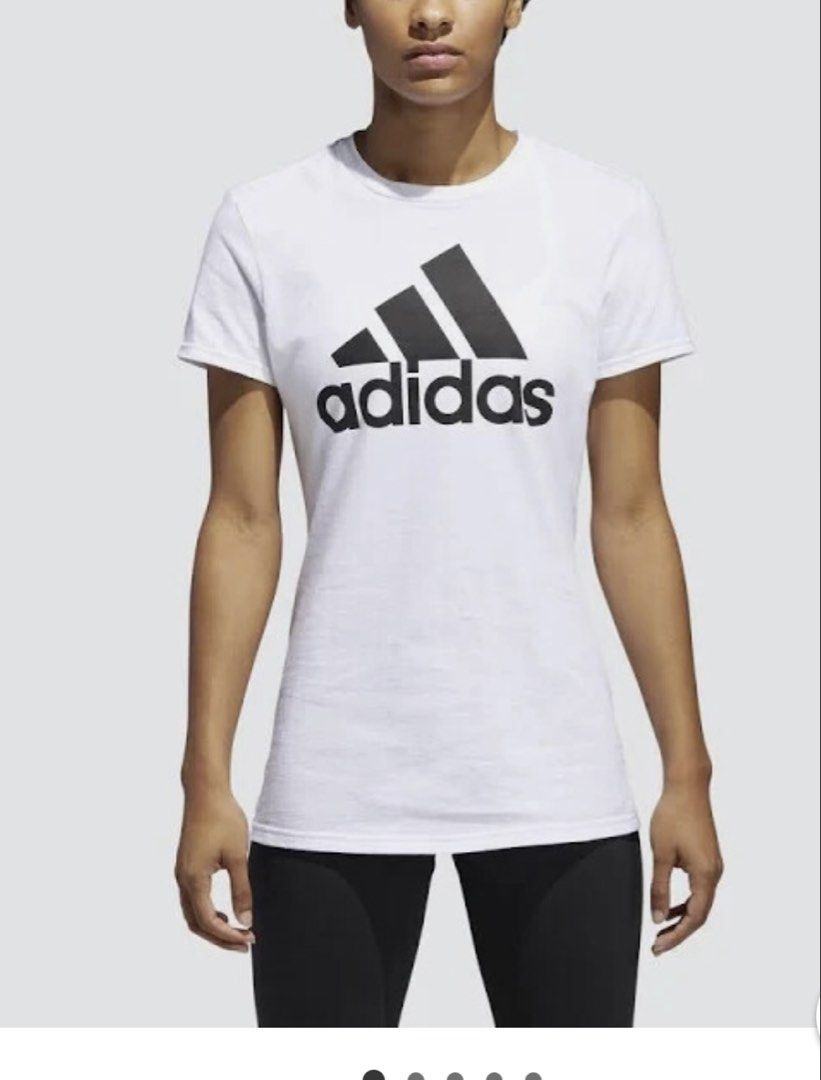 Adidas Essential Logo Tee in White/Black (Category: Activewear) located in Imus. Submitted by prelovedfinds84 (Listing ID 1468993630, Image 1). Description: This classic, regular-fit athletic t-shirt is crafted from 100% cotton single jersey fabric for a soft and comfortable feel. It features a traditional crewneck collar, short sleeves, and prominently displays the signature adidas Badge of Sport logo printed in black across the chest..