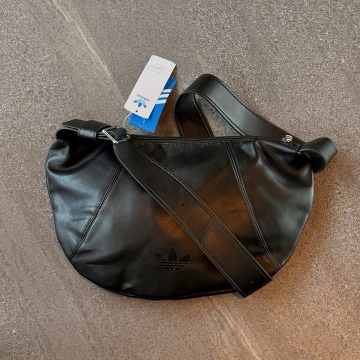 Adidas Polyurethane Hobo/Sling Bag (Category: Sling Bags) located in Manila. Submitted by hatline_co. (Listing ID 1469095106, Image 1). Description: .