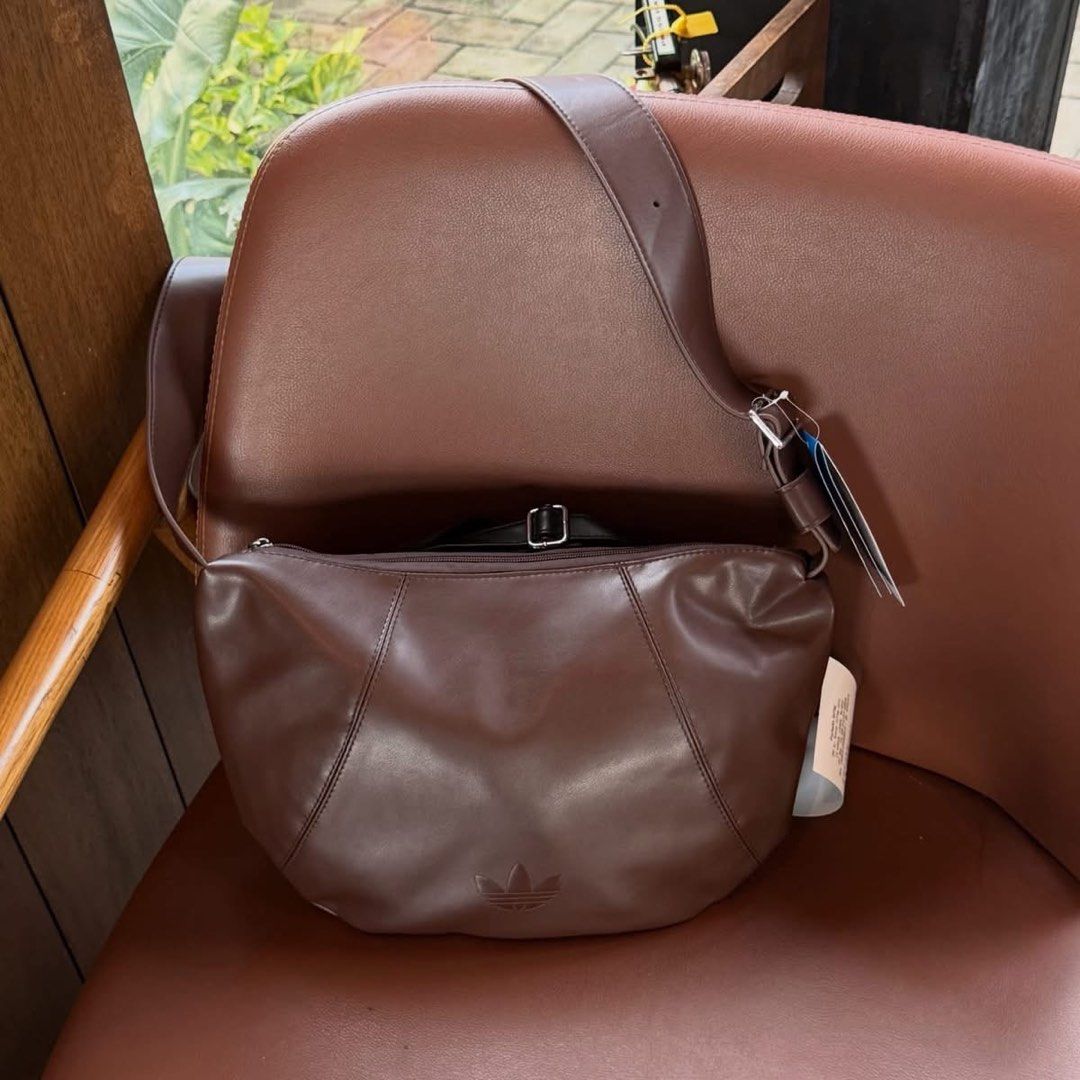 Adidas Polyurethane Hobo/Sling Bag (Category: Sling Bags) located in Manila. Submitted by hatline_co. (Listing ID 1469095348, Image 3). Description: .