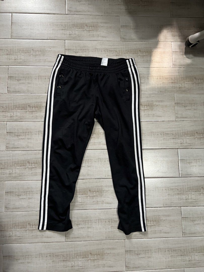 Adidas Tear-Away Pants (Category: Trousers) located in Angono. Submitted by odd.fitt (Listing ID 1468982495, Image 1). Description: Medium on tag 30-36W 36L 6-7H Missing lace Removed paint on some buttons 1000.