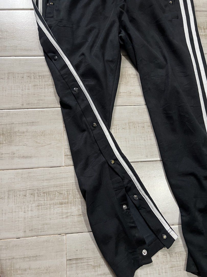 Adidas Tear-Away Pants (Category: Trousers) located in Angono. Submitted by odd.fitt (Listing ID 1468982495, Image 2). Description: Medium on tag 30-36W 36L 6-7H Missing lace Removed paint on some buttons 1000.