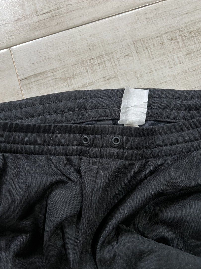Adidas Tear-Away Pants (Category: Trousers) located in Angono. Submitted by odd.fitt (Listing ID 1468982495, Image 3). Description: Medium on tag 30-36W 36L 6-7H Missing lace Removed paint on some buttons 1000.