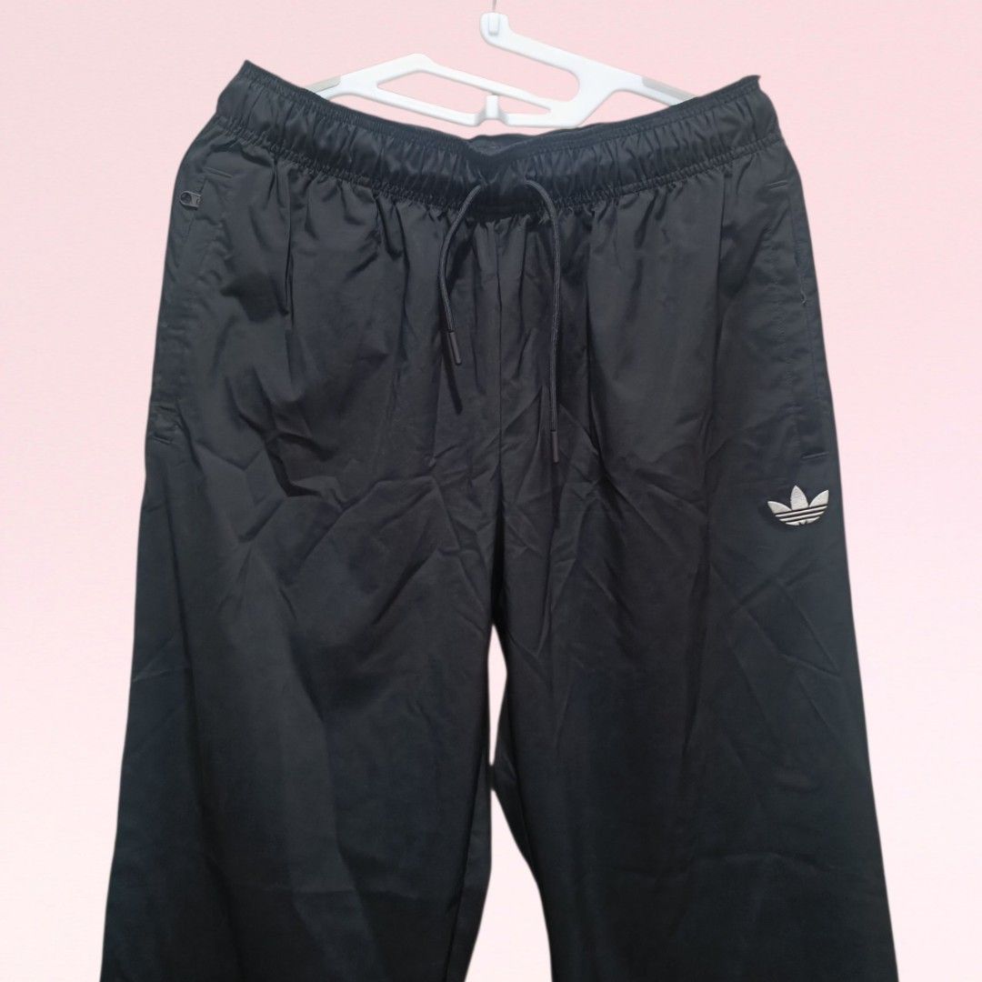 Adidas Tracker Pants (Category: Activewear) located in Quezon City. Submitted by firstlovedbyb (Listing ID 1468964332, Image 3). Description: Authentic Adidas Tracker Pants. With adjustable waist. 2 side zipper pockets. With an adjustable hemline. No major flaws or issues. Good as new. Size on tag: S Waist: 28-32 inches Length: 41 inches.