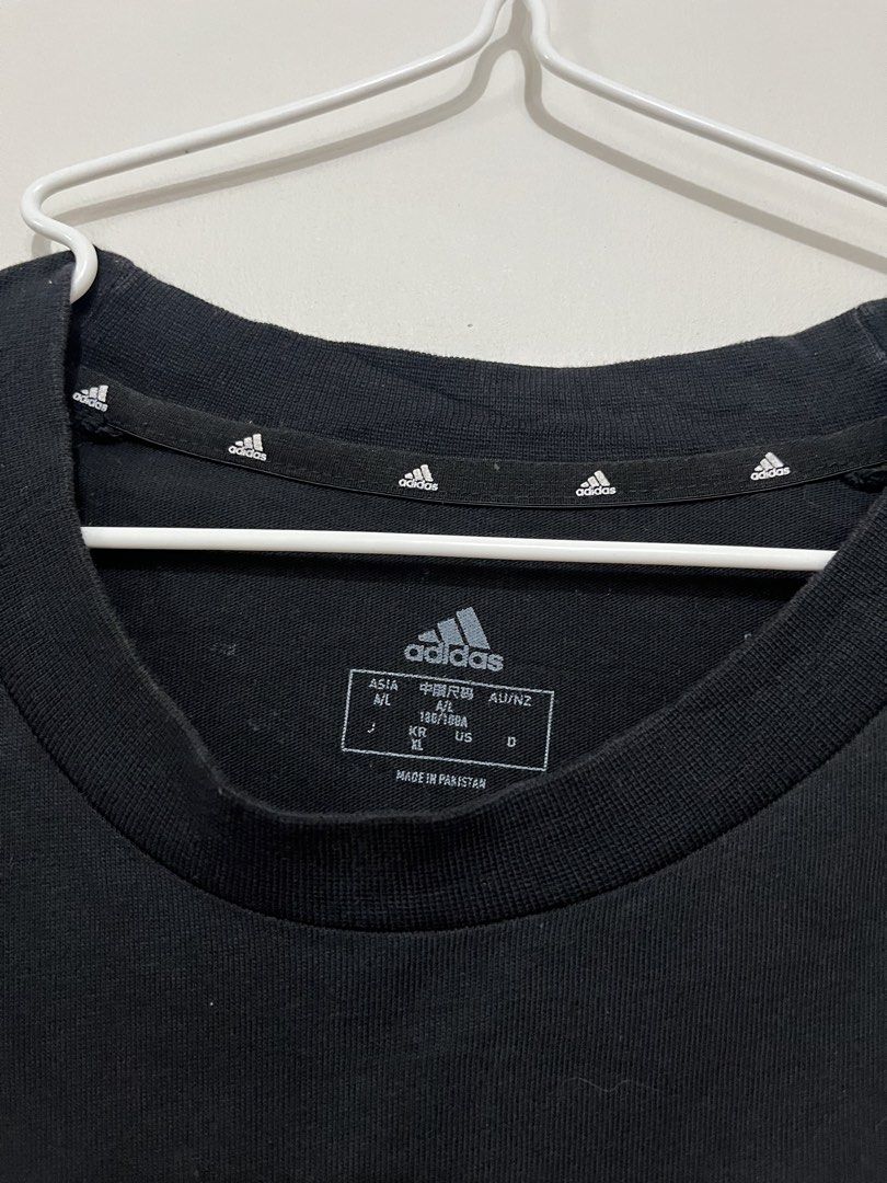 Adidas U Big Logo T-Shirt (Category: Tshirts & Polo Shirts ) located in Daet. Submitted by rens.finds (Listing ID 1469111979, Image 3). Description: - Brand: Adidas - Condition: 9/10 - Issue: ❌ - Color Rate: 9/10 - Length x Width ( 28x 22 ) “Actual product color may vary due to lighting.” ⬅️ Swipe For More Details .