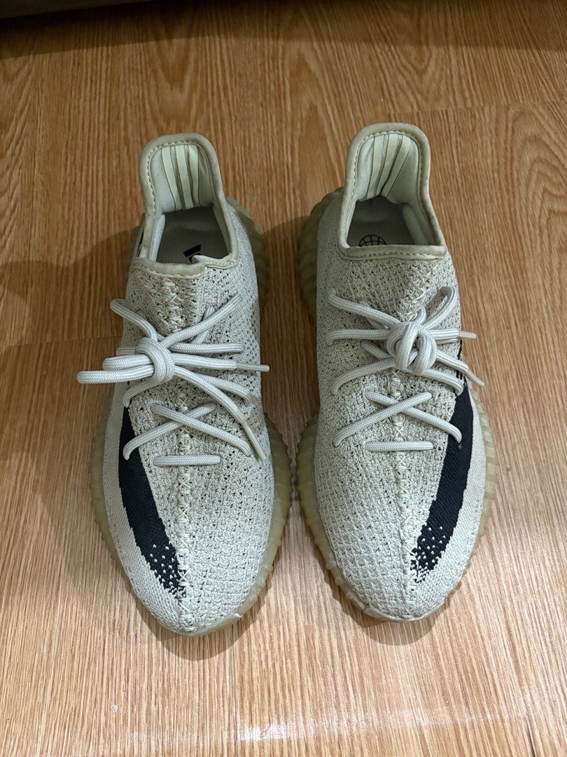Adidas Yeezy Boost 350 V2 Slate Core Black (Category: Sneakers) located in Manila. Submitted by prelovedby_yna (Listing ID 1469094603, Image 1). Description: - Adidas Yeezy Boost 350 V2 - Slate with distinctive black side stripe - Classic rope laces, ribbed gum midsole, visible Boost cushioning, branded insoles - Normal signs of wear on outsoles and collar lining - 100% authentic, no box - Check photo listing for size - Nego.