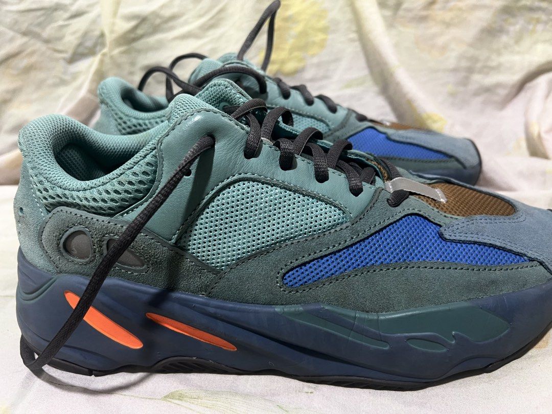 Adidas Yeezy Boost 700 Wash Orange (Category: Sneakers) located in Malabon City. Submitted by arsher25 (Listing ID 1469021335, Image 1). Description: - Brand/Model: Adidas Yeezy Boost 700 - Colorway: Wash Orange (teal, blue, brown upper with orange midsole accents) - Size: US 9 / UK 8.5 / EU 42.5 - Condition: Clean inside and out, worn only a few times - Inclusions: Standard laces - Perfect addition to any sneaker rotation.